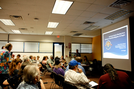 Kingman residences watching a slideshow