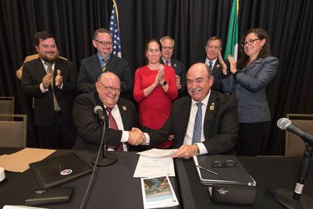 Officials with International Boundary and Water Commission, United States and Mexico, celebrate the signing of a new Colorado River agreement, Minute 323