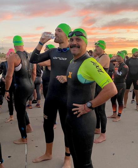  Andrew Muniz and Nick Valverde preparing for the 1-mile swim in front of the Tempe Center for the Arts.
