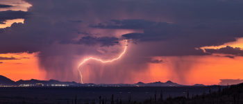 Thunderstorm over Phoenix, Arizona at sunset. Monsoon thunderstorm with lightning over Phoenix, Arizona at sunset.