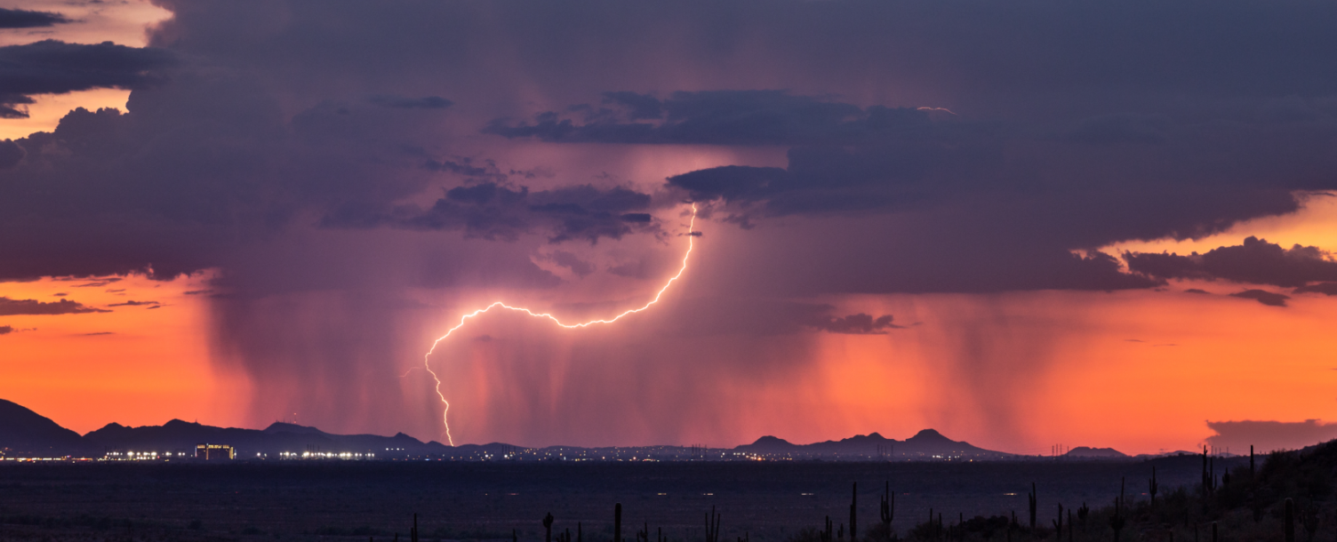 Thunderstorm over Phoenix, Arizona at sunset. Monsoon thunderstorm with lightning over Phoenix, Arizona at sunset.